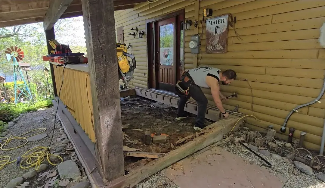 Porch foundation exposed and corrected after demolition